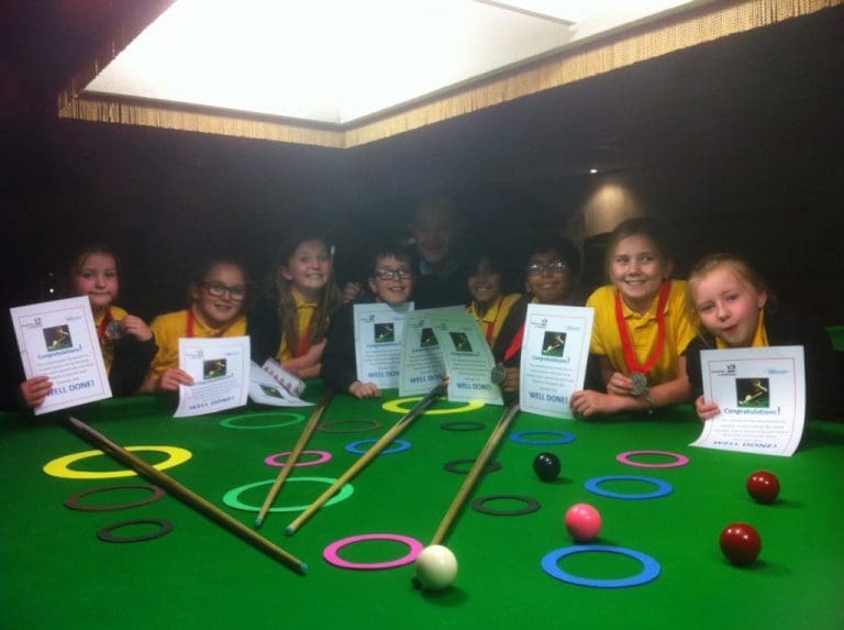 DUMFRIES PRIMARY PUPILS QUE UP TO TRY SNOOKER