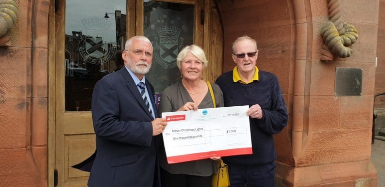 Annan Christmas Lights Committee ‘Illuminated’ With Cunninghame Housing Association’s Cheque