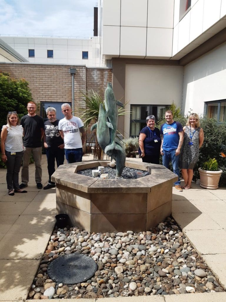 LOCAL MEN’S SHED GROUP TRANSFORM GARDEN PATIENTS