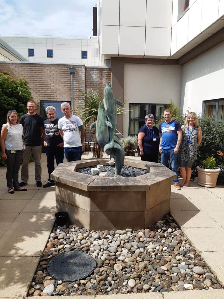 LOCAL MEN’S SHED GROUP TRANSFORM GARDEN PATIENTS