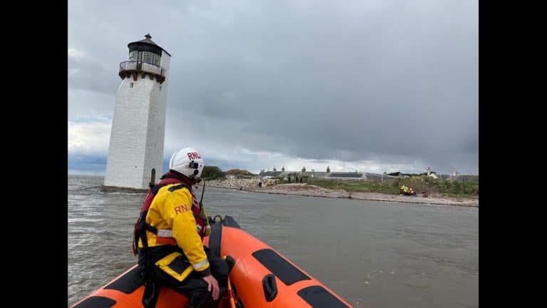 RNLI pluck fisherman from the sea Near Southerness