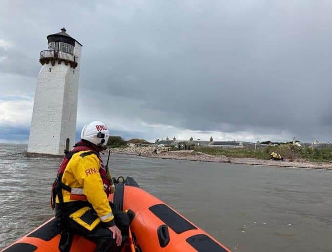 RNLI pluck fisherman from the sea Near Southerness