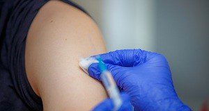 Bid to provide vaccinations across entire community as cases remain high 