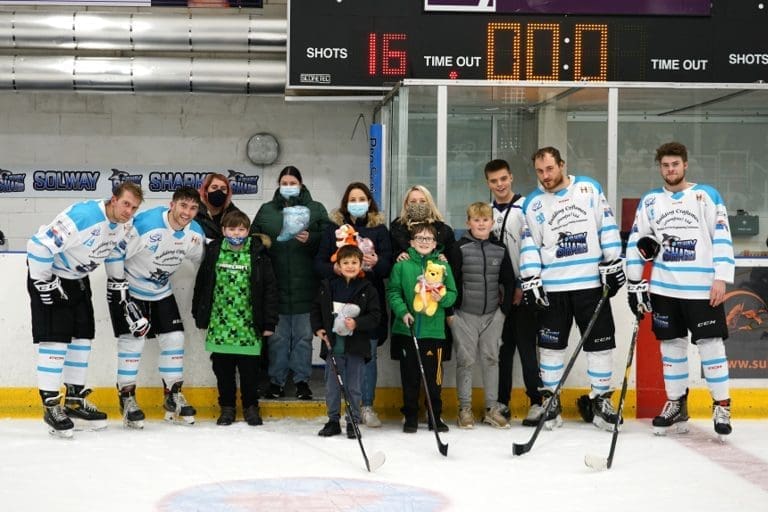 Sharks Gift Toys to Local Kids in Hospital