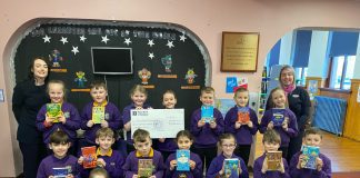 Stranraer opticians raises £1,100 to buy books for local schoolchildren