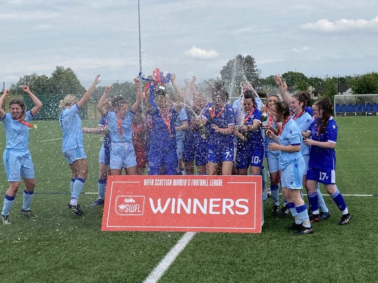 QUEENS LADIES PRESENTED WITH WINNERS TROPHY