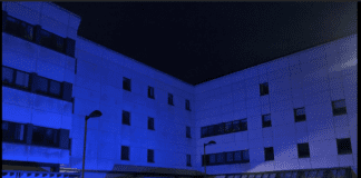 Mountainhall Treatment Centre lit up in blue to mark NHS' 75th anniversary