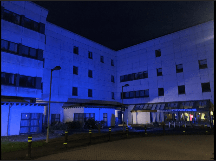 Mountainhall Treatment Centre lit up in blue to mark NHS' 75th anniversary