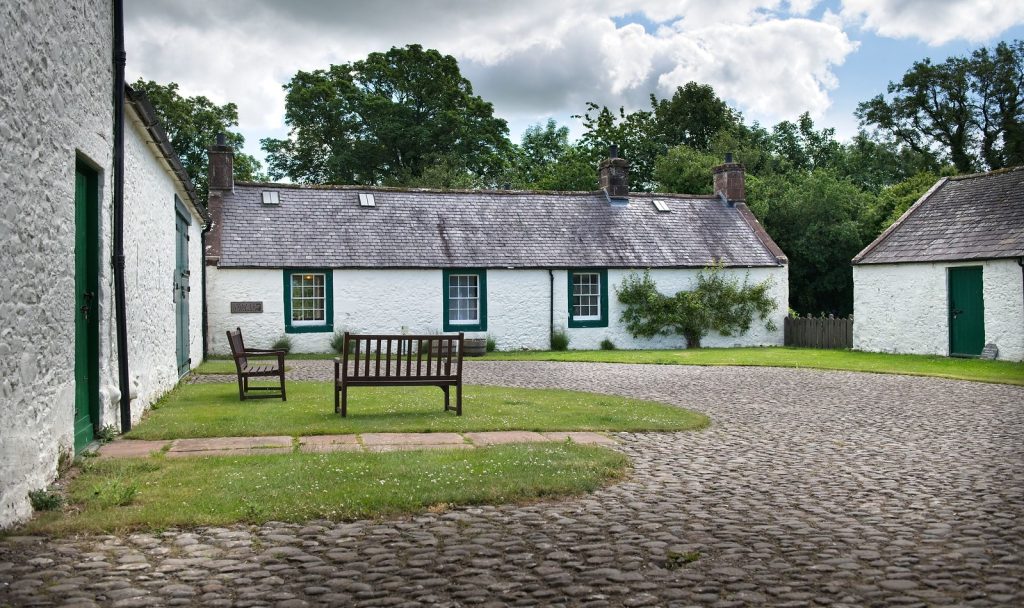 A Farm in Dumfries and Galloway where poet Robert Burns wrote Auld Lang Syne has been awarded accredited museum status after an intensive three-year drive to improve the care of its collection.