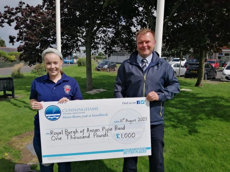 Cunninghame Housing Association Fuels the Sound of Success: £1,000 Gift to Royal Burgh Annan Pipe Band