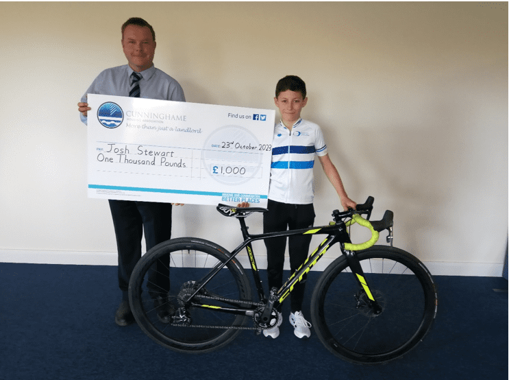 Cunninghame Housing Association’s Generous Sponsorship Boosts Young Cyclist, Josh Stewart, with £1,000 Cheque