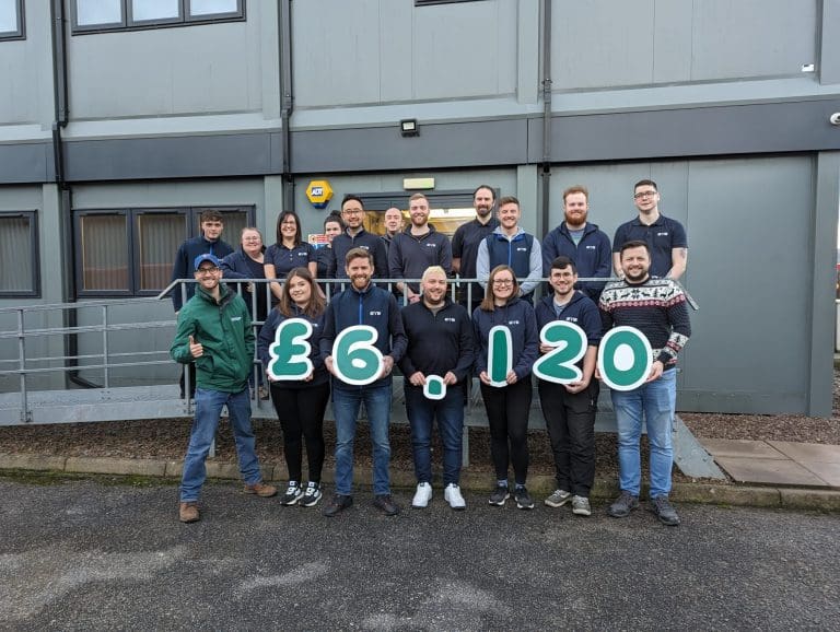 Dalbeattie IT firm Scores Big With £6k Charity Donation for Macmillan