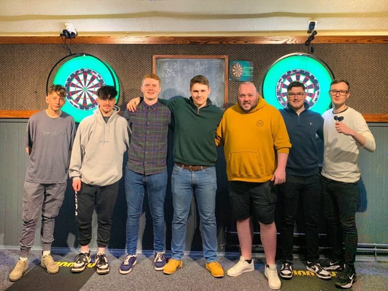 Throwing for a Cause: Greens Darts Team in Dumfries Takes Aim at Prostate Cancer