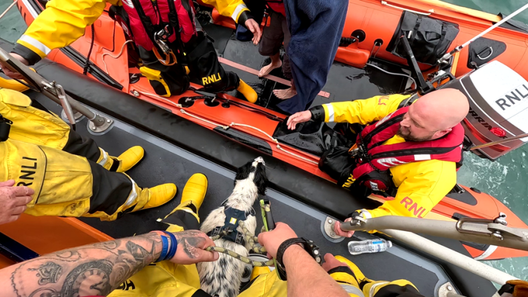 Portpatrick RNLI save two people and a dog on first launch of new lifeboat.